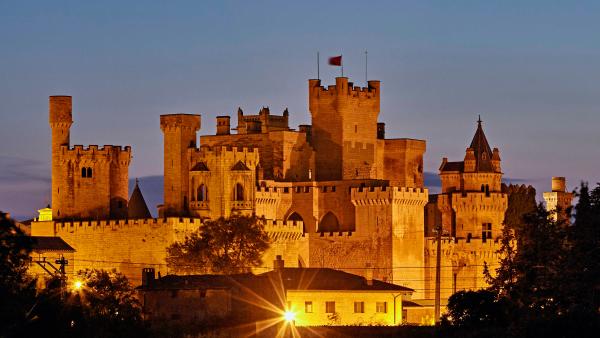 Silhouette of the Castillo de Olite at dusk